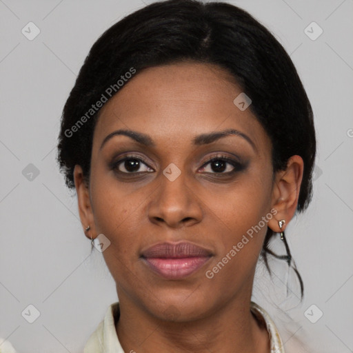 Joyful black young-adult female with medium  black hair and brown eyes