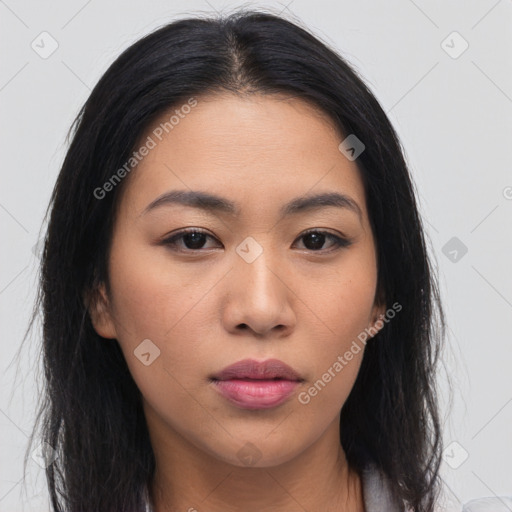 Neutral asian young-adult female with medium  brown hair and brown eyes