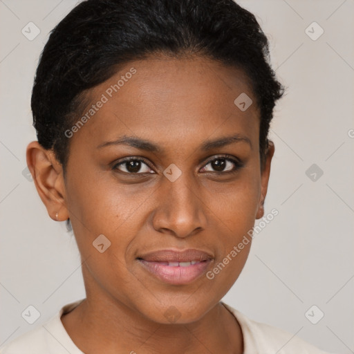 Joyful black young-adult female with short  brown hair and brown eyes