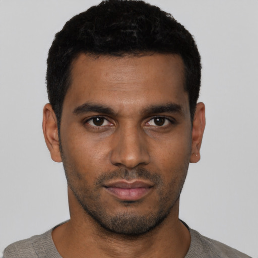 Neutral black young-adult male with short  black hair and brown eyes