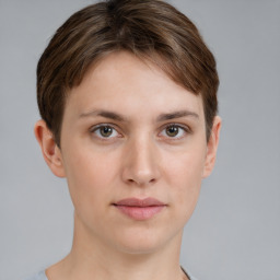 Neutral white young-adult female with short  brown hair and brown eyes