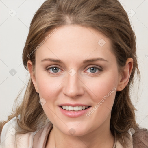 Joyful white young-adult female with medium  brown hair and blue eyes