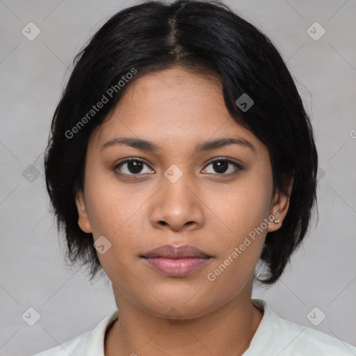 Joyful asian young-adult female with medium  black hair and brown eyes