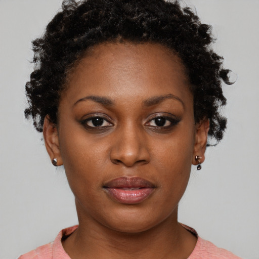 Neutral black young-adult female with short  brown hair and brown eyes