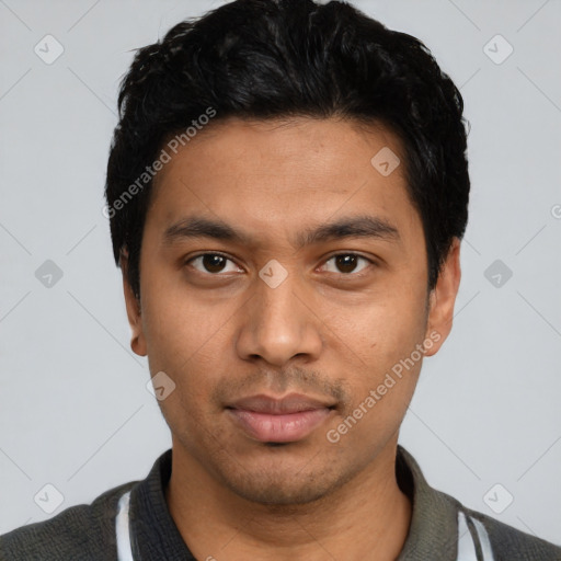 Neutral latino young-adult male with short  black hair and brown eyes
