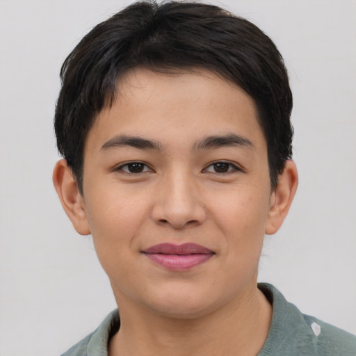 Joyful asian young-adult male with short  brown hair and brown eyes