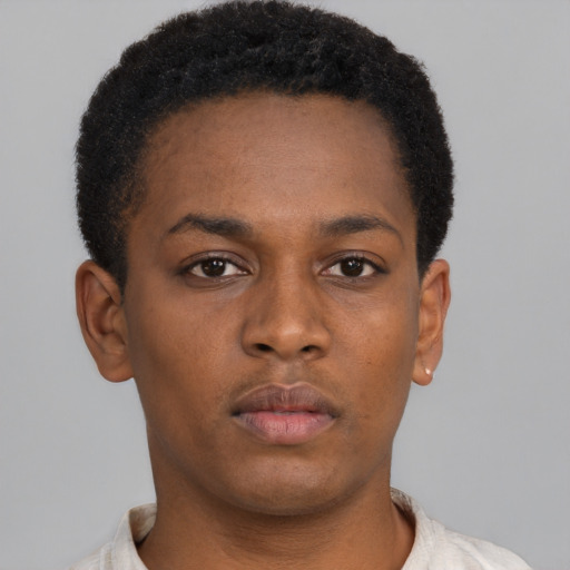 Neutral black young-adult female with short  brown hair and brown eyes