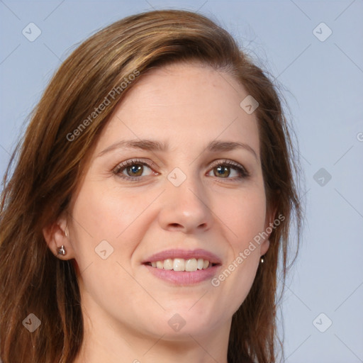 Joyful white young-adult female with long  brown hair and green eyes