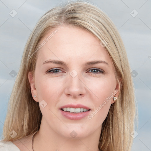 Joyful white young-adult female with long  brown hair and blue eyes