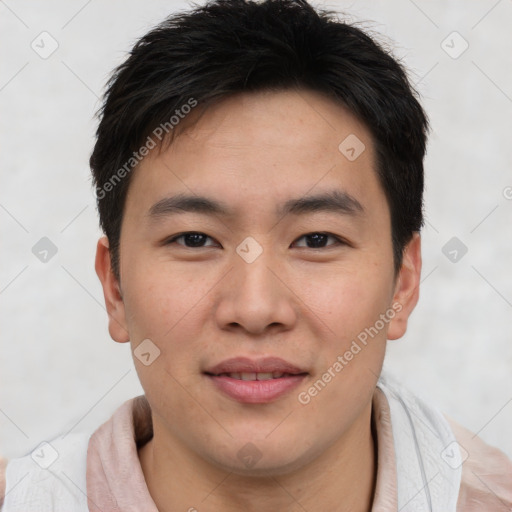 Joyful asian young-adult male with short  brown hair and brown eyes