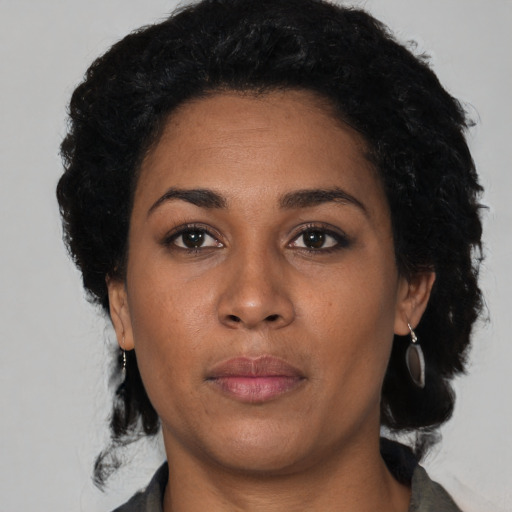 Neutral latino young-adult female with medium  black hair and brown eyes
