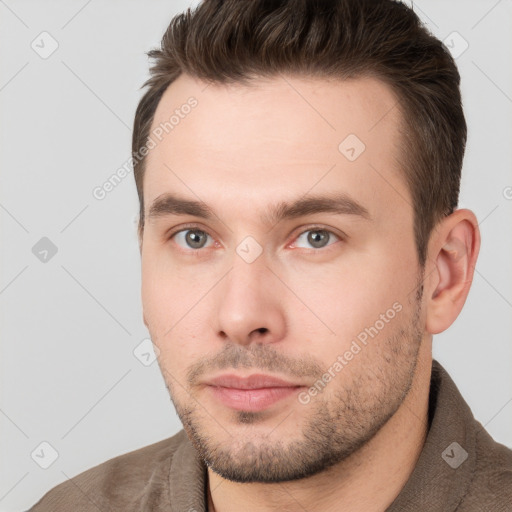 Neutral white young-adult male with short  brown hair and brown eyes