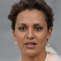 Joyful white adult female with short  brown hair and brown eyes