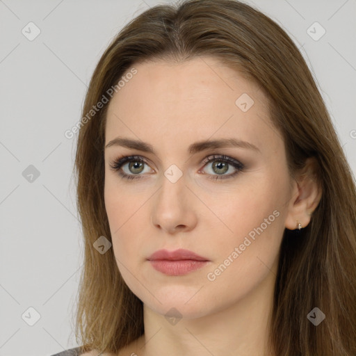 Neutral white young-adult female with long  brown hair and brown eyes