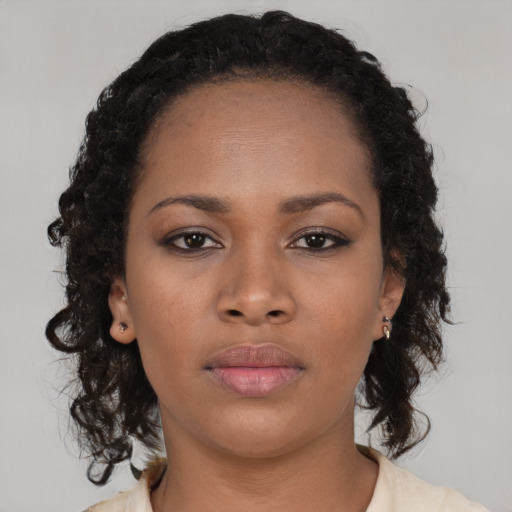 Neutral black young-adult female with long  black hair and brown eyes