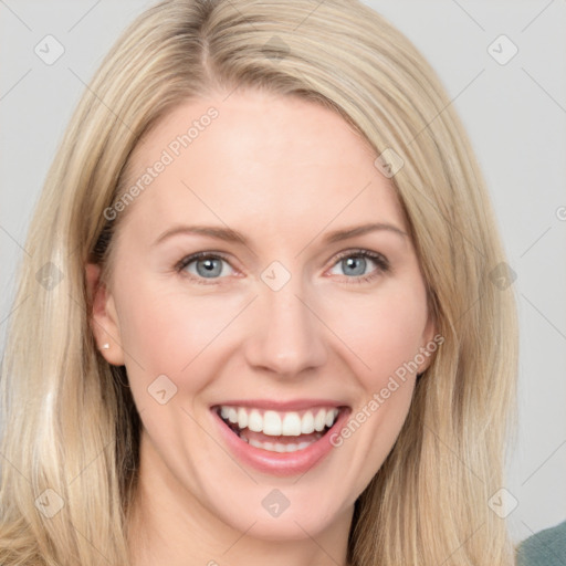 Joyful white young-adult female with long  brown hair and blue eyes