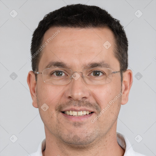 Joyful white adult male with short  brown hair and brown eyes