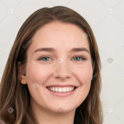 Joyful white young-adult female with long  brown hair and green eyes