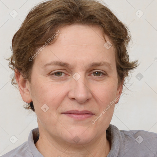 Joyful white adult female with short  brown hair and grey eyes