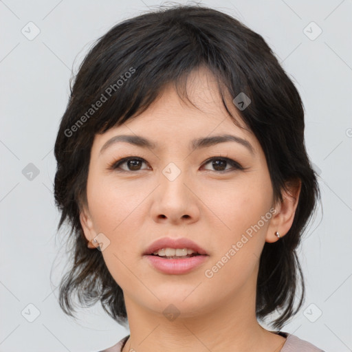 Joyful asian young-adult female with medium  brown hair and brown eyes