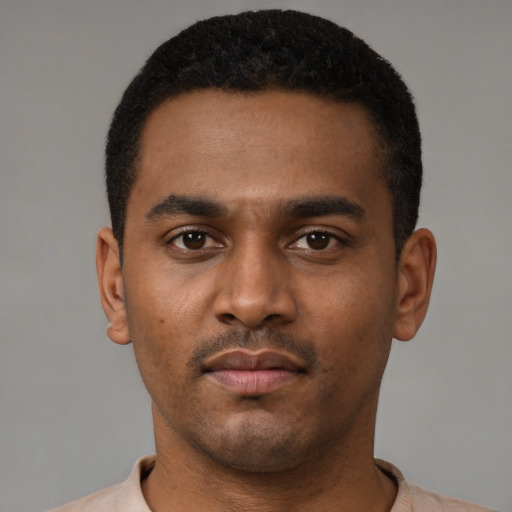 Neutral latino young-adult male with short  black hair and brown eyes
