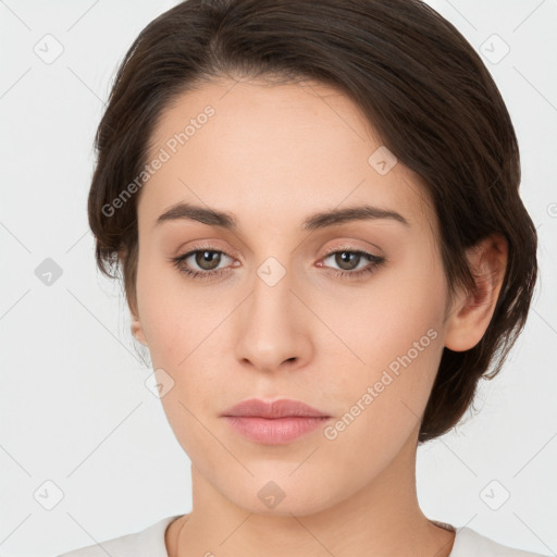 Neutral white young-adult female with medium  brown hair and brown eyes