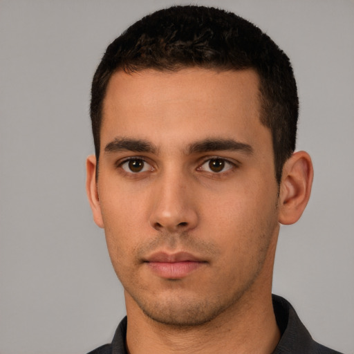 Neutral white young-adult male with short  black hair and brown eyes