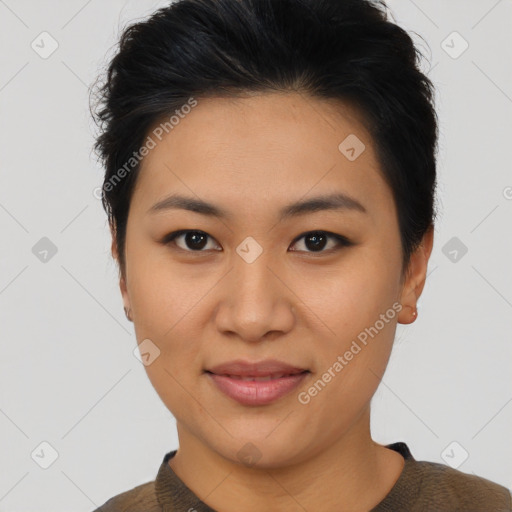 Joyful asian young-adult female with short  black hair and brown eyes