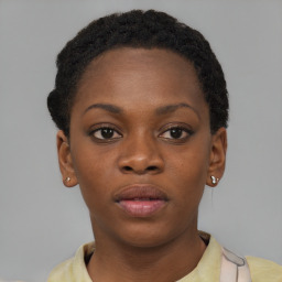 Neutral black young-adult female with short  brown hair and brown eyes