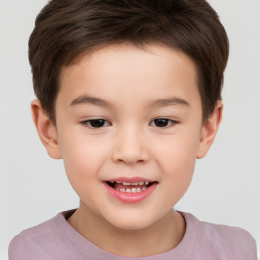 Joyful white child male with short  brown hair and brown eyes