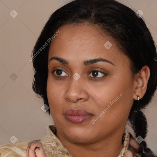 Joyful latino young-adult female with medium  brown hair and brown eyes