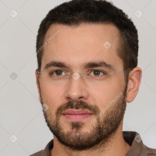 Neutral white young-adult male with short  brown hair and brown eyes