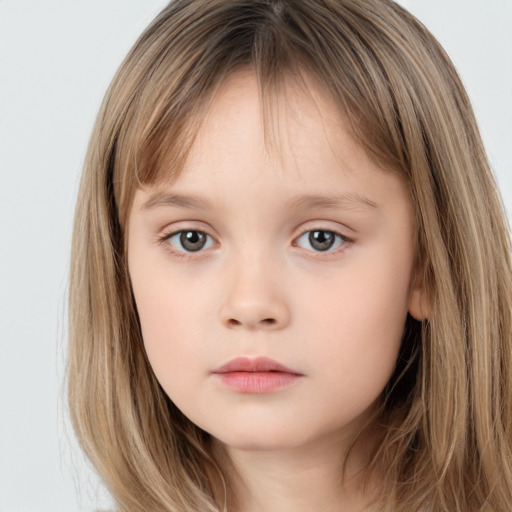 Neutral white child female with long  brown hair and brown eyes