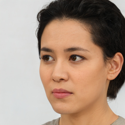 Neutral white young-adult female with short  brown hair and brown eyes