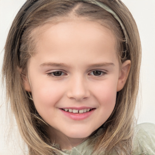 Joyful white child female with long  brown hair and brown eyes