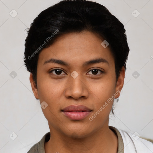 Joyful latino young-adult female with short  black hair and brown eyes