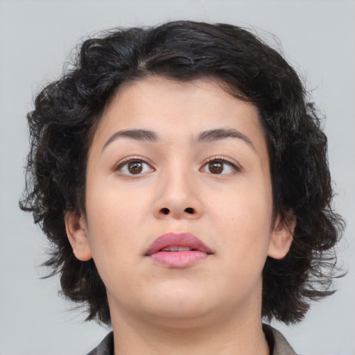Neutral asian young-adult female with medium  brown hair and brown eyes