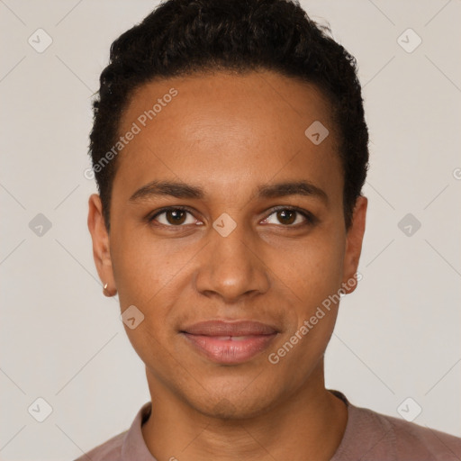 Joyful black young-adult male with short  black hair and brown eyes