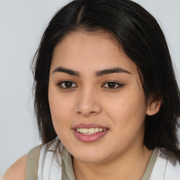 Joyful asian young-adult female with medium  brown hair and brown eyes