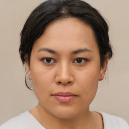 Neutral asian young-adult female with medium  brown hair and brown eyes