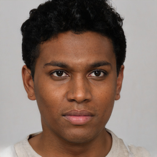 Neutral black young-adult male with short  black hair and brown eyes