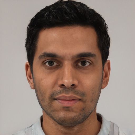 Neutral latino young-adult male with short  black hair and brown eyes