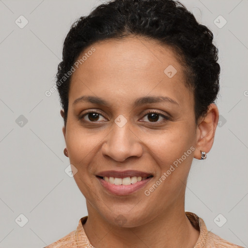 Joyful latino young-adult female with short  brown hair and brown eyes