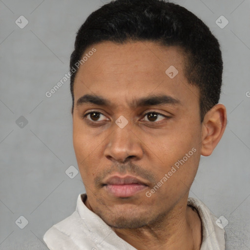 Neutral latino young-adult male with short  black hair and brown eyes