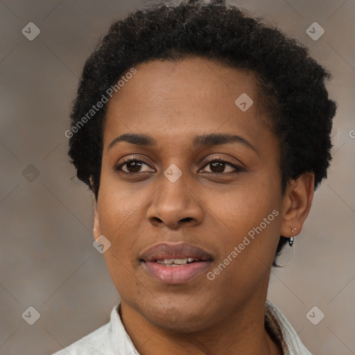 Joyful black adult female with short  brown hair and brown eyes