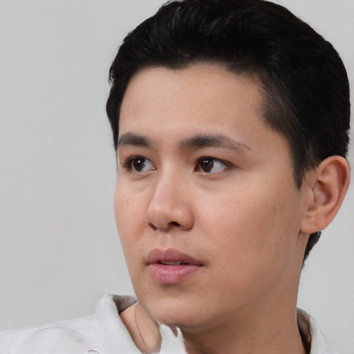 Neutral asian young-adult male with short  black hair and brown eyes