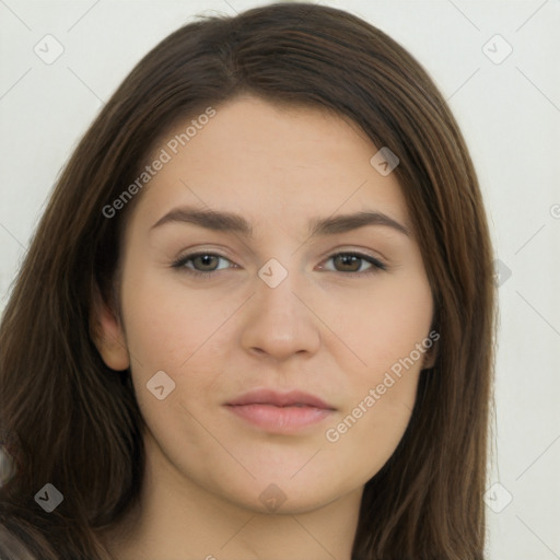 Neutral white young-adult female with long  brown hair and brown eyes