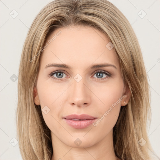 Joyful white young-adult female with long  brown hair and green eyes