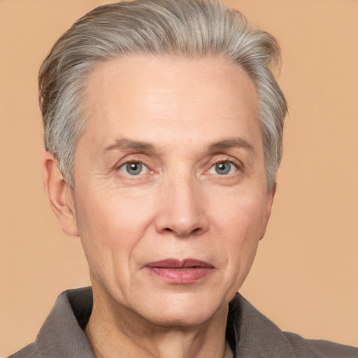 Joyful white middle-aged male with short  gray hair and grey eyes