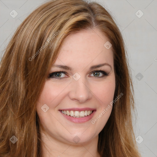 Joyful white young-adult female with long  brown hair and green eyes